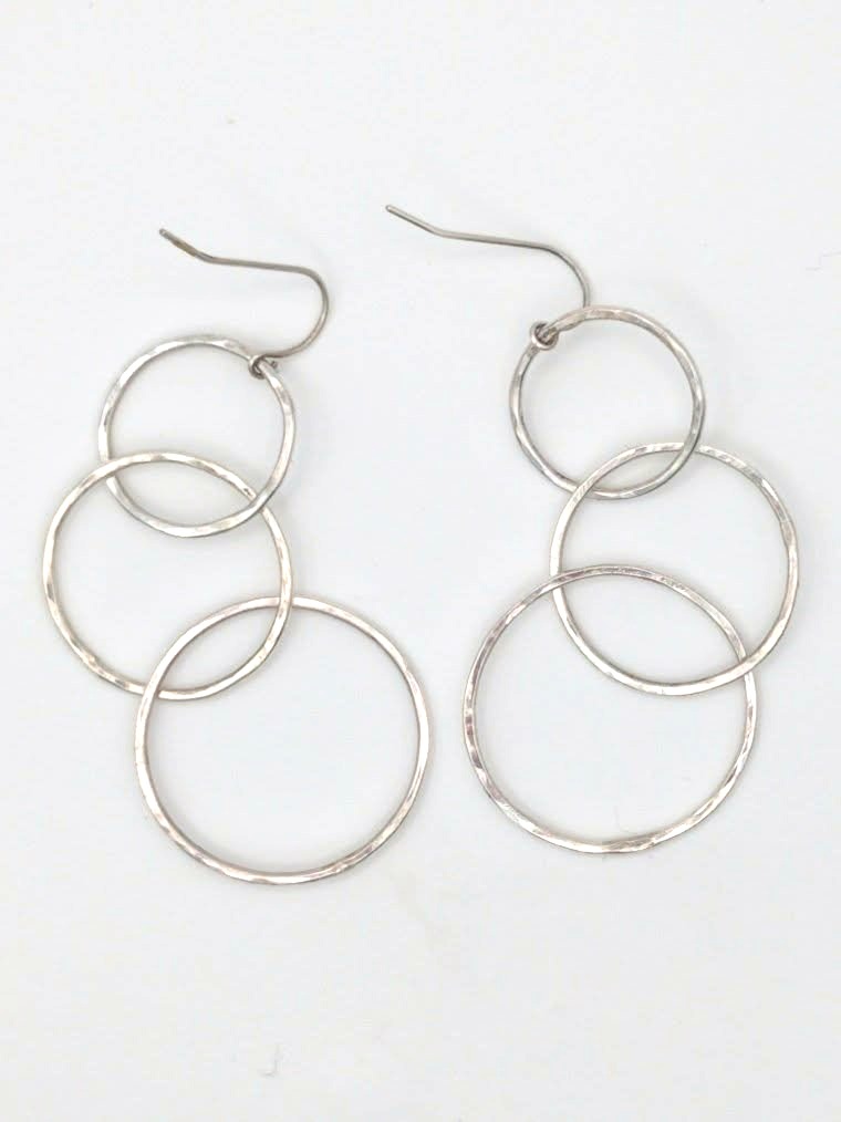 Meridian Earrings: three graduated sterling silver circles on handmade ear hooks.