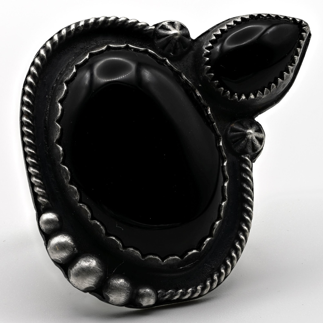 Offset black onyx ring in oxidized sterling silver.