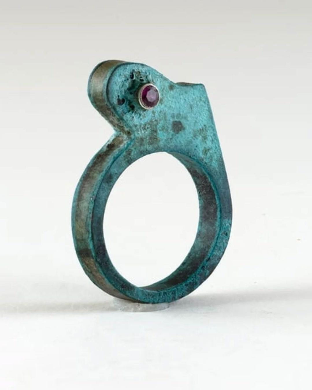 Prickly Pear Ring in sterling silver, copper, verdigris, and lab ruby.